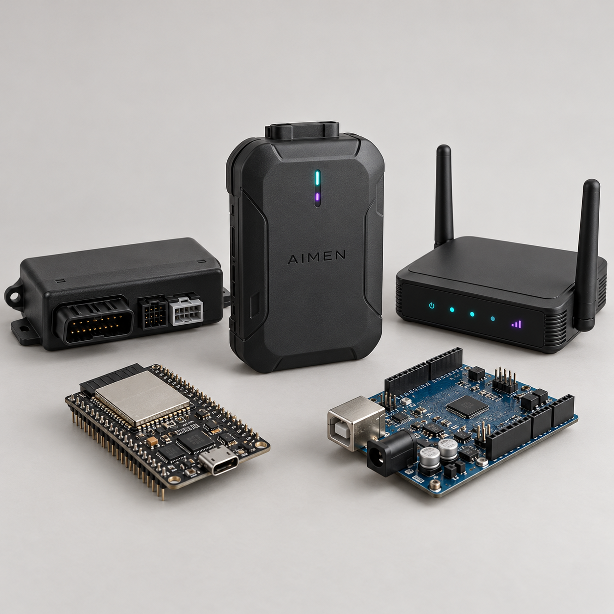 AIMEN IoT product range featuring an embossed GPS tracker, telematics interface, connectivity router and development boards